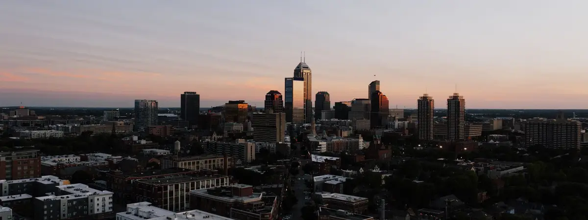 The Indianapolis, Indiana skyline at sunset from the air