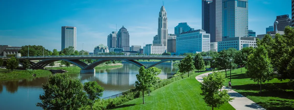 The Columbus, Ohio skyline behind a riverside park