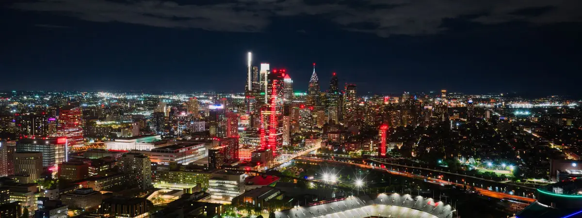 The Philadelphia, Pennsylvania skyline at night from the air